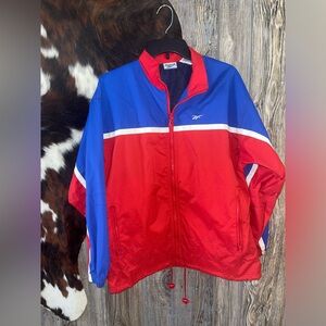 Vintage Reebok size small men’s red and blue zippered windbreaker